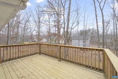 Enjoy effortless single-level living in a desirable resort-style on Lake Monticello Golf Course in Virginia - for sale on GolfHomes.com, golf home, golf lot