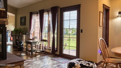 Welcome to this charming custom home on 1.11 acres with on Bell Nob Golf Course in Wyoming - for sale on GolfHomes.com, golf home, golf lot