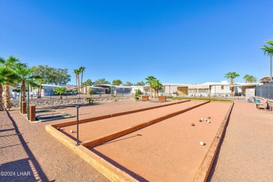 *ON LEASED LAND*

Paradise is Found! Don't judge the book by on London Bridge Golf Course in Arizona - for sale on GolfHomes.com, golf home, golf lot