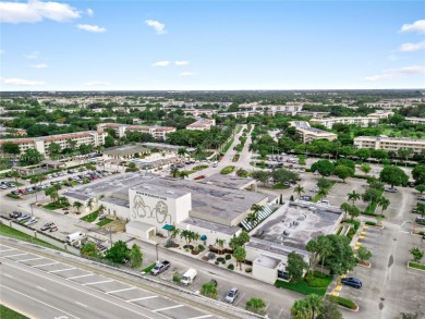 SPACIOUS 2 BED / 2 BATH LOCATED IN DESIRABLE COMMUNITY WITH on Wynmoor Golf Course in Florida - for sale on GolfHomes.com, golf home, golf lot