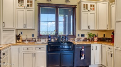 Welcome to this charming custom home on 1.11 acres with on Bell Nob Golf Course in Wyoming - for sale on GolfHomes.com, golf home, golf lot
