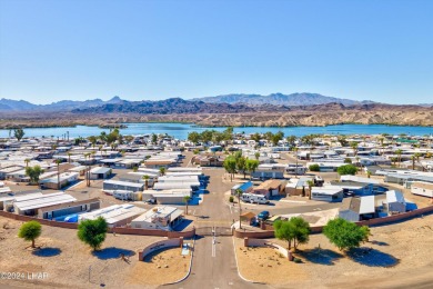 *ON LEASED LAND*

Paradise is Found! Don't judge the book by on London Bridge Golf Course in Arizona - for sale on GolfHomes.com, golf home, golf lot