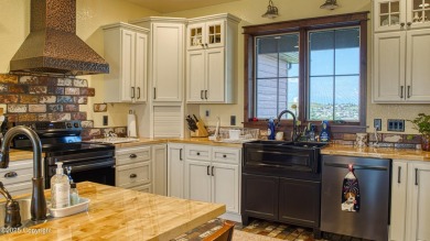 Welcome to this charming custom home on 1.11 acres with on Bell Nob Golf Course in Wyoming - for sale on GolfHomes.com, golf home, golf lot