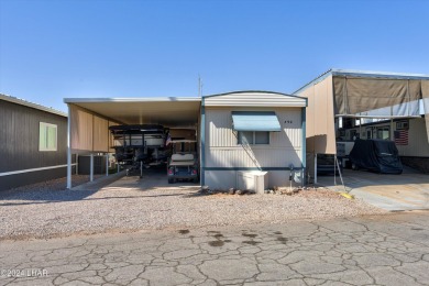 *ON LEASED LAND*

Paradise is Found! Don't judge the book by on London Bridge Golf Course in Arizona - for sale on GolfHomes.com, golf home, golf lot