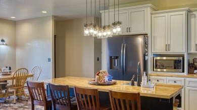 Welcome to this charming custom home on 1.11 acres with on Bell Nob Golf Course in Wyoming - for sale on GolfHomes.com, golf home, golf lot