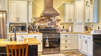 Welcome to this charming custom home on 1.11 acres with on Bell Nob Golf Course in Wyoming - for sale on GolfHomes.com, golf home, golf lot