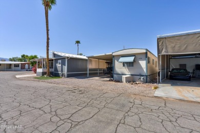 *ON LEASED LAND*

Paradise is Found! Don't judge the book by on London Bridge Golf Course in Arizona - for sale on GolfHomes.com, golf home, golf lot