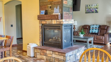 Welcome to this charming custom home on 1.11 acres with on Bell Nob Golf Course in Wyoming - for sale on GolfHomes.com, golf home, golf lot