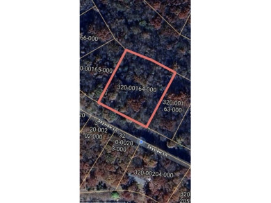 Ready to build your dream home? Quiet and gently wooded with on Holiday Island Executive Golf Course in Arkansas - for sale on GolfHomes.com, golf home, golf lot