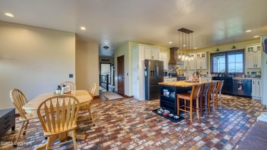 Welcome to this charming custom home on 1.11 acres with on Bell Nob Golf Course in Wyoming - for sale on GolfHomes.com, golf home, golf lot