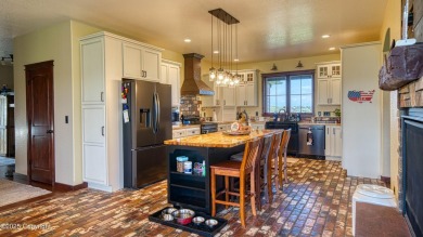 Welcome to this charming custom home on 1.11 acres with on Bell Nob Golf Course in Wyoming - for sale on GolfHomes.com, golf home, golf lot