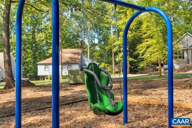 Enjoy effortless single-level living in a desirable resort-style on Lake Monticello Golf Course in Virginia - for sale on GolfHomes.com, golf home, golf lot