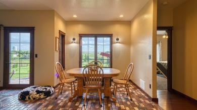 Welcome to this charming custom home on 1.11 acres with on Bell Nob Golf Course in Wyoming - for sale on GolfHomes.com, golf home, golf lot