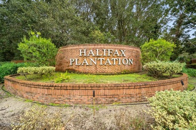 Welcome to this beautifully designed 3-bedroom, 3-bathroom home on Halifax Plantation Golf Club in Florida - for sale on GolfHomes.com, golf home, golf lot