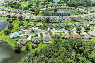 **BEAUTIFUL POOL HOME ,WITH HOT TUB, OVERLOOKING PRESERVE AND on Caloosa Greens Executive Golf Course in Florida - for sale on GolfHomes.com, golf home, golf lot