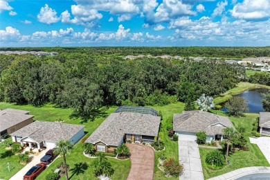 **BEAUTIFUL POOL HOME ,WITH HOT TUB, OVERLOOKING PRESERVE AND on Caloosa Greens Executive Golf Course in Florida - for sale on GolfHomes.com, golf home, golf lot