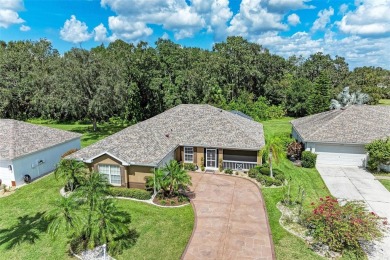 **BEAUTIFUL POOL HOME ,WITH HOT TUB, OVERLOOKING PRESERVE AND on Caloosa Greens Executive Golf Course in Florida - for sale on GolfHomes.com, golf home, golf lot