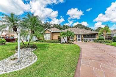 **BEAUTIFUL POOL HOME ,WITH HOT TUB, OVERLOOKING PRESERVE AND on Caloosa Greens Executive Golf Course in Florida - for sale on GolfHomes.com, golf home, golf lot