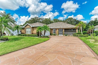 **BEAUTIFUL POOL HOME ,WITH HOT TUB, OVERLOOKING PRESERVE AND on Caloosa Greens Executive Golf Course in Florida - for sale on GolfHomes.com, golf home, golf lot