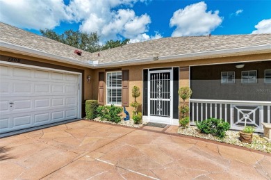 **BEAUTIFUL POOL HOME ,WITH HOT TUB, OVERLOOKING PRESERVE AND on Caloosa Greens Executive Golf Course in Florida - for sale on GolfHomes.com, golf home, golf lot