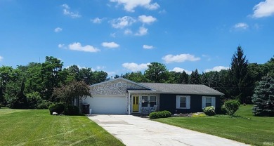 Enjoy the beautiful open views from this 3 bedroom, one and a on Coyote Creek Golf Club in Indiana - for sale on GolfHomes.com, golf home, golf lot