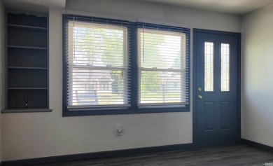 Enjoy the beautiful open views from this 3 bedroom, one and a on Coyote Creek Golf Club in Indiana - for sale on GolfHomes.com, golf home, golf lot