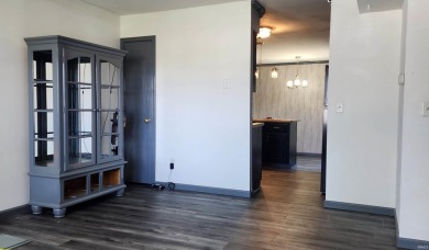 Enjoy the beautiful open views from this 3 bedroom, one and a on Coyote Creek Golf Club in Indiana - for sale on GolfHomes.com, golf home, golf lot