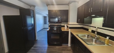 Enjoy the beautiful open views from this 3 bedroom, one and a on Coyote Creek Golf Club in Indiana - for sale on GolfHomes.com, golf home, golf lot