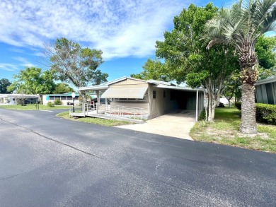 Come see this cozy 2 bed, 1 bath mobile home in the Highland on DeBary Golf and Country Club in Florida - for sale on GolfHomes.com, golf home, golf lot