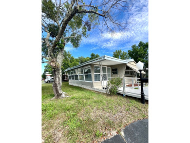 Come see this cozy 2 bed, 1 bath mobile home in the Highland on DeBary Golf and Country Club in Florida - for sale on GolfHomes.com, golf home, golf lot