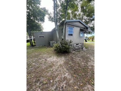 Come see this cozy 2 bed, 1 bath mobile home in the Highland on DeBary Golf and Country Club in Florida - for sale on GolfHomes.com, golf home, golf lot