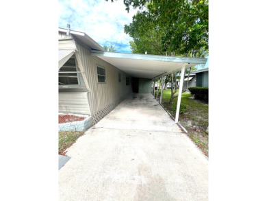 Come see this cozy 2 bed, 1 bath mobile home in the Highland on DeBary Golf and Country Club in Florida - for sale on GolfHomes.com, golf home, golf lot