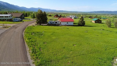 Beautiful building lot in Star Valley Ranch near the hub of the on Cedar Creek Golf Course in Wyoming - for sale on GolfHomes.com, golf home, golf lot