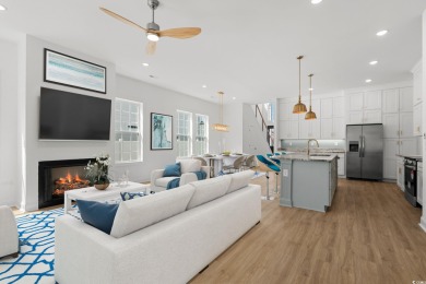 Welcome to this luxurious 4-bedroom, 3.5-bath beach home! on Whispering Pines in South Carolina - for sale on GolfHomes.com, golf home, golf lot