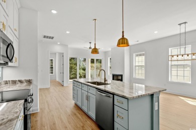 Welcome to this luxurious 4-bedroom, 3.5-bath beach home! on Whispering Pines in South Carolina - for sale on GolfHomes.com, golf home, golf lot