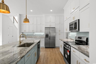 Welcome to this luxurious 4-bedroom, 3.5-bath beach home! on Whispering Pines in South Carolina - for sale on GolfHomes.com, golf home, golf lot
