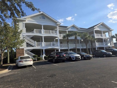 This is a lovely first floor middle unit with some nice upgrades on Barefoot Resort and Golf Club  in South Carolina - for sale on GolfHomes.com, golf home, golf lot