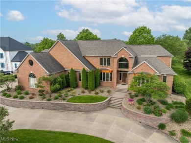 Welcome to this breathtaking brick estate, perfectly positioned on Glenmoor Country Club in Ohio - for sale on GolfHomes.com, golf home, golf lot