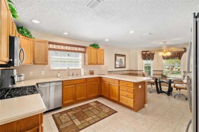 BOND PAID!! WELCOME TO THIS DESIGNER CYPRESS MODEL HOME IN THE on The Links of Spruce Creek in Florida - for sale on GolfHomes.com, golf home, golf lot