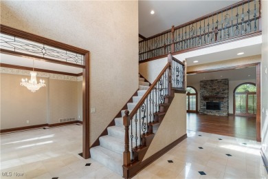 Welcome to this breathtaking brick estate, perfectly positioned on Glenmoor Country Club in Ohio - for sale on GolfHomes.com, golf home, golf lot