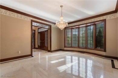Welcome to this breathtaking brick estate, perfectly positioned on Glenmoor Country Club in Ohio - for sale on GolfHomes.com, golf home, golf lot