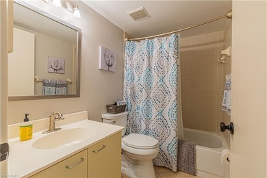 Welcome to this bright, beautifully maintained turnkey-furnished on Riviera Golf Club in Florida - for sale on GolfHomes.com, golf home, golf lot