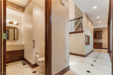 Welcome to this breathtaking brick estate, perfectly positioned on Glenmoor Country Club in Ohio - for sale on GolfHomes.com, golf home, golf lot