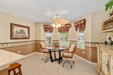 BOND PAID!! WELCOME TO THIS DESIGNER CYPRESS MODEL HOME IN THE on The Links of Spruce Creek in Florida - for sale on GolfHomes.com, golf home, golf lot