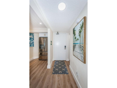 Stunning Condo @ Isla Del Sol with Dual-Purpose Investment: Your on Isla Del Sol Yacht and Country Club in Florida - for sale on GolfHomes.com, golf home, golf lot