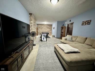 Welcome to this stunning two-story home nestled in one of the on Foxcliff Golf Club in Indiana - for sale on GolfHomes.com, golf home, golf lot