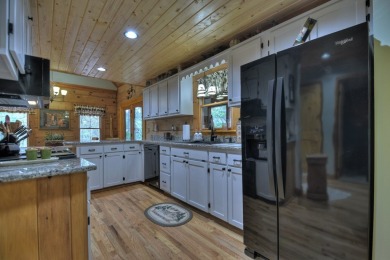 FURNISHED CABIN!!  Charming 3-Bedroom, 3-Bath Log Cabin in the on White Path Golf Club in Georgia - for sale on GolfHomes.com, golf home, golf lot