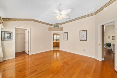 BOND PAID!! WELCOME TO THIS DESIGNER CYPRESS MODEL HOME IN THE on The Links of Spruce Creek in Florida - for sale on GolfHomes.com, golf home, golf lot