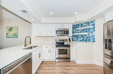 Stunning Condo @ Isla Del Sol with Dual-Purpose Investment: Your on Isla Del Sol Yacht and Country Club in Florida - for sale on GolfHomes.com, golf home, golf lot