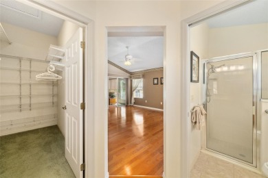 BOND PAID!! WELCOME TO THIS DESIGNER CYPRESS MODEL HOME IN THE on The Links of Spruce Creek in Florida - for sale on GolfHomes.com, golf home, golf lot